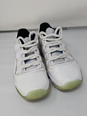 Nike Kids White Sneakers with Black Accents and Glow Green Soles